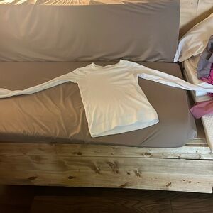 kinda old lululemon shirt. wore once no stains or hole. white
